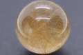 濃厚ルチル マニハール産 ゴールドルチル入り水晶丸玉22mm